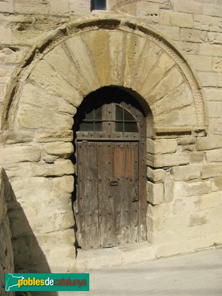 Forès - Església de Sant Miquel, porta dels Homes