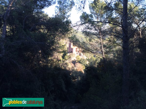 La Casa de Guanta, des del camí que puja al Puig Rodó