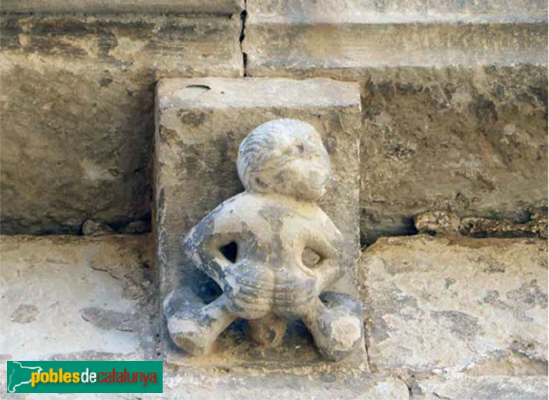 Vallbona de les Monges - Mènsula de l'absis del monestir representant un home en posició fecal