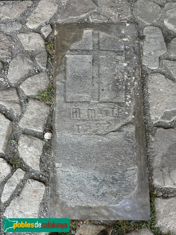 Erill la Vall - Església de Santa Eulàlia. Làpida