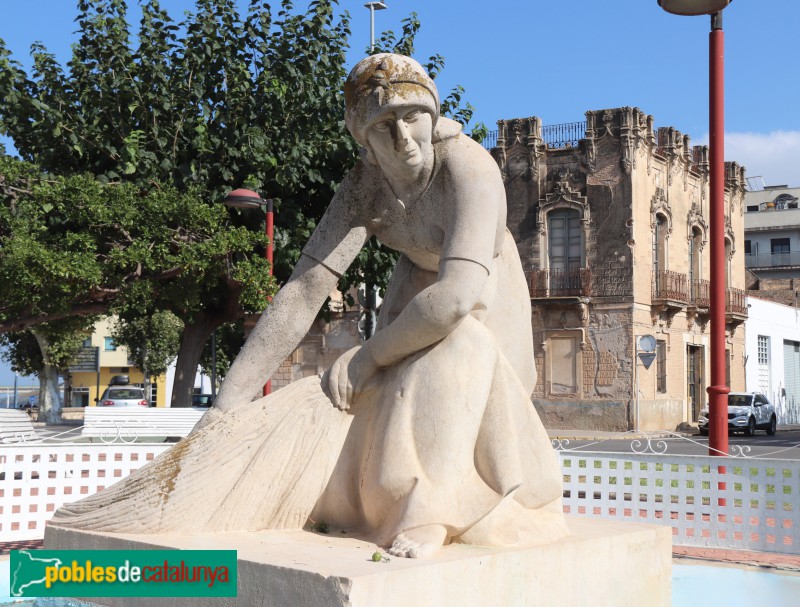 Escultura <i>Arrossaire de l'Ebre amb ramàs</i>