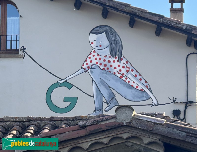 L'Esquirol - Mural <i>Lletres vives del poble</i> (Foto: Anna Corcoll, 2026) L'Esquirol - Mural <i>Lletres vives del poble</i>