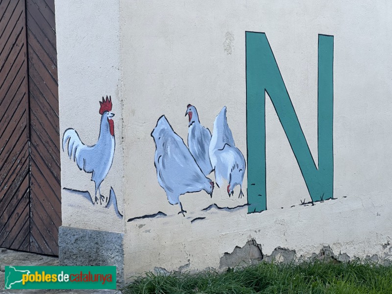 L'Esquirol - Mural <i>Lletres vives del poble</i> (Foto: Anna Corcoll, 2026) L'Esquirol - Mural <i>Lletres vives del poble</i>