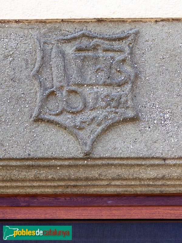 Sant Julià de Vilatorta - Carrer de la Mercè. Llinda de Cal Martinet (1571) (Foto: Albert Esteves, 2026) Sant Julià de Vilatorta - Carrer de la Mercè. Llinda de Cal Martinet (1571)