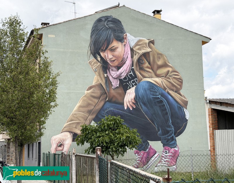 Calldetenes - Mural de Sabotaje al Montaje (Matías Mata) <i>La grandeza de lo pequeño</i> (FACC 2025) (Foto: Albert Esteves, 2026) Calldetenes - Mural de Sabotaje al Montaje (Matías Mata) <i>La grandeza de lo pequeño</i> (FACC 2025)