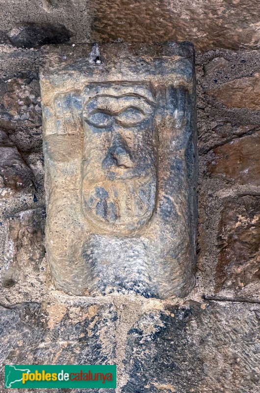 Isòvol - Església de Sant Pere d'Olopte. Mènsula de l'atlant (Foto: Albert Esteves, 2026) Isòvol - Església de Sant Pere d'Olopte. Mènsula de l'atlant